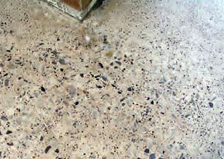 Nicely polished concrete floor with pebbles showing