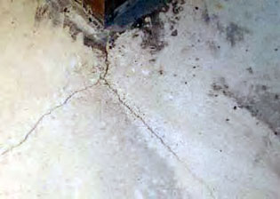 Cracked, stained floor